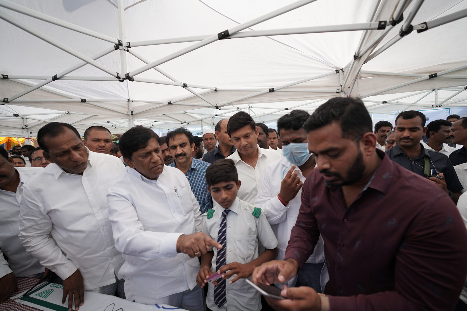 Aarogya Telangana camp at Medchal · politicians, Vera team and students receiving Health Cards